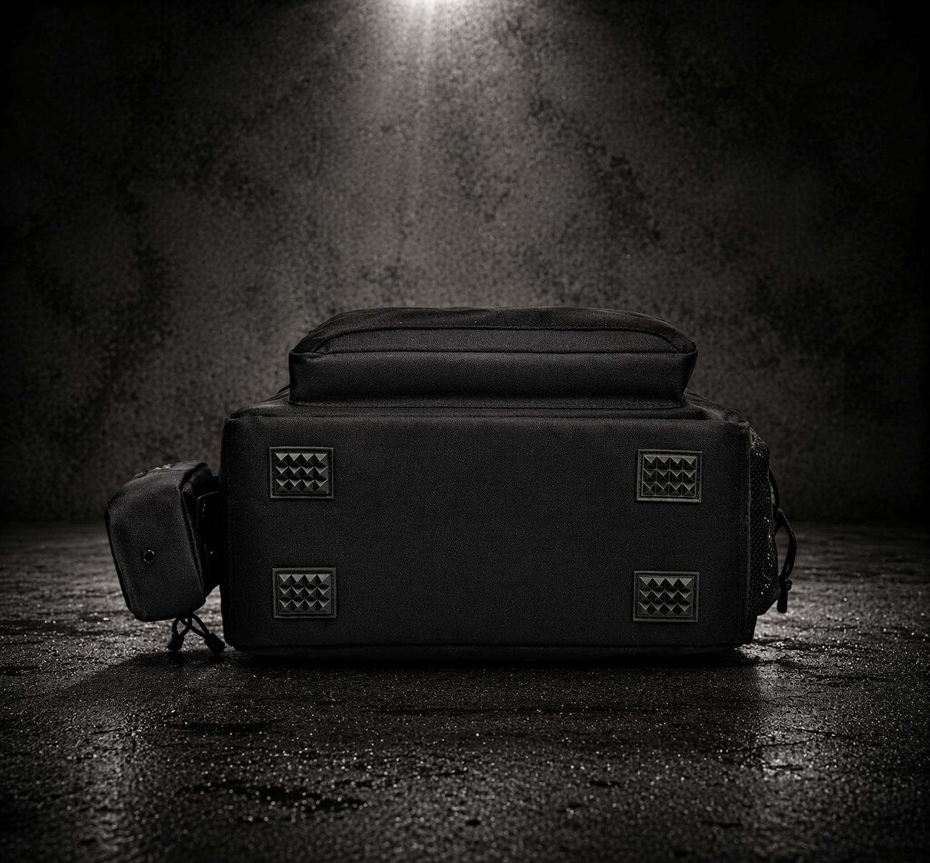 Bottom view of tactical insulated cooler bag showing reinforced base and protective feet