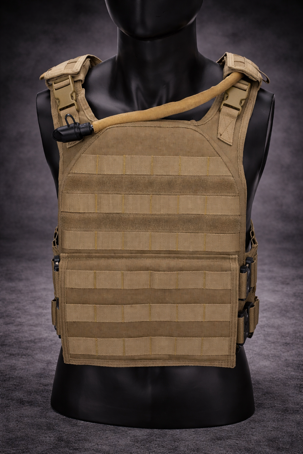 tactical hydration bladder installed in plate carrier with drinking hose routed across shoulder for easy access