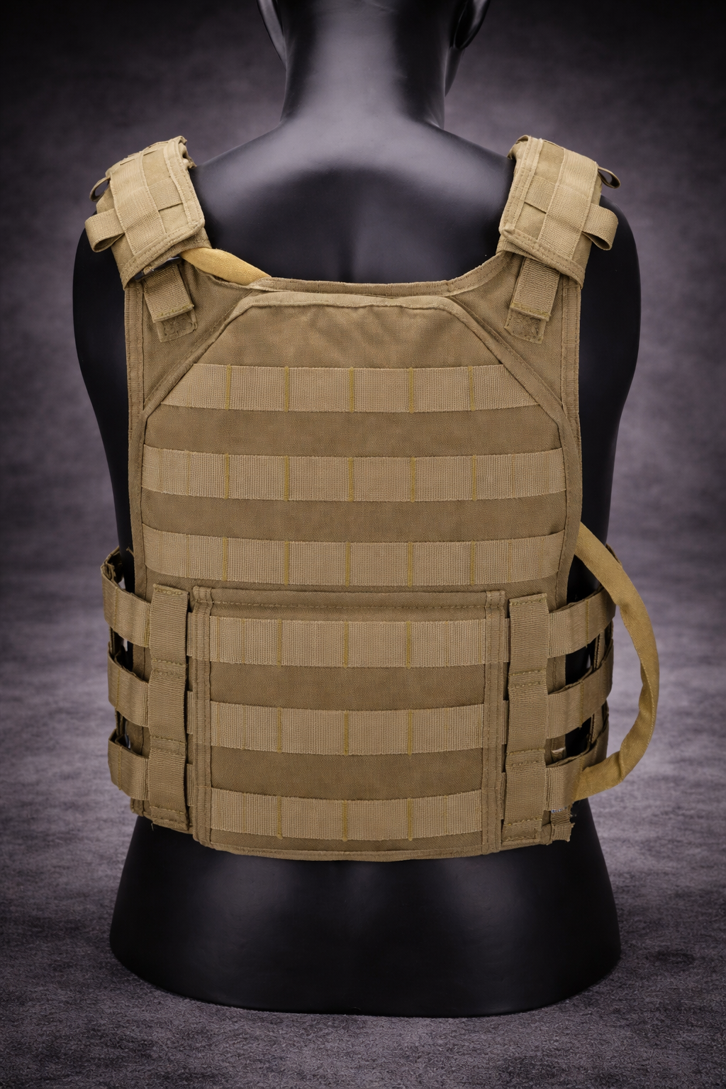rear view of tactical hydration bladder installed in plate carrier showing fit and hose routing compatibility